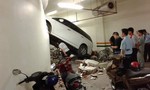 Thiếu nữ 20 tuổi lái ô tô đâm thủng tường trong hầm để xe