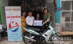 Tặng xe máy cho gia đình nghèo ở quận Bình Tân