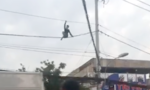 Nam thanh niên nghi ngáo đá đu dây điện ở Sài Gòn