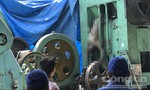 Người đàn ông chết khô lủng lẳng trên chiếc máy dập sắt ở Sài Gòn