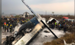 Máy bay chở 71 người bốc cháy khi hạ cánh