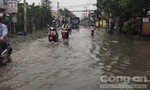 Nhiều nơi ngập lênh láng sau cơn mưa giải nhiệt ở Sài Gòn