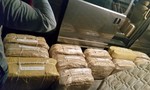 Phát hiện 100 bánh cocain trong container thép phế liệu