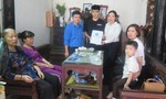 BHXH Việt Nam tặng bảo hiểm cho hai con nữ công nhân tử nạn