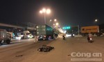 Vượt đèn đỏ, hai thanh niên bị xe container húc văng ở Sài Gòn