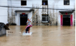 Trung Quốc nâng mức khẩn cấp đối phó với mưa lũ