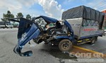 Cabin xe tải vỡ nát sau va chạm xe container, tài xế và phụ xe đi cấp cứu