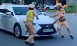 Video: Nữ tài xế xe Lexus chạy quá tốc độ, khóa cửa ôtô rồi 'thông chốt' CSGT