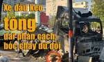 Clip xe đầu kéo tông dải phân cách, bốc cháy dữ dội ở TPHCM