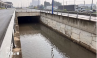 Nước ngập sâu tại hầm chui trước Bến xe Miền Đông mới sau cơn mưa lớn